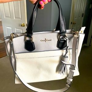 Coke Haan gray and white leather purse never used